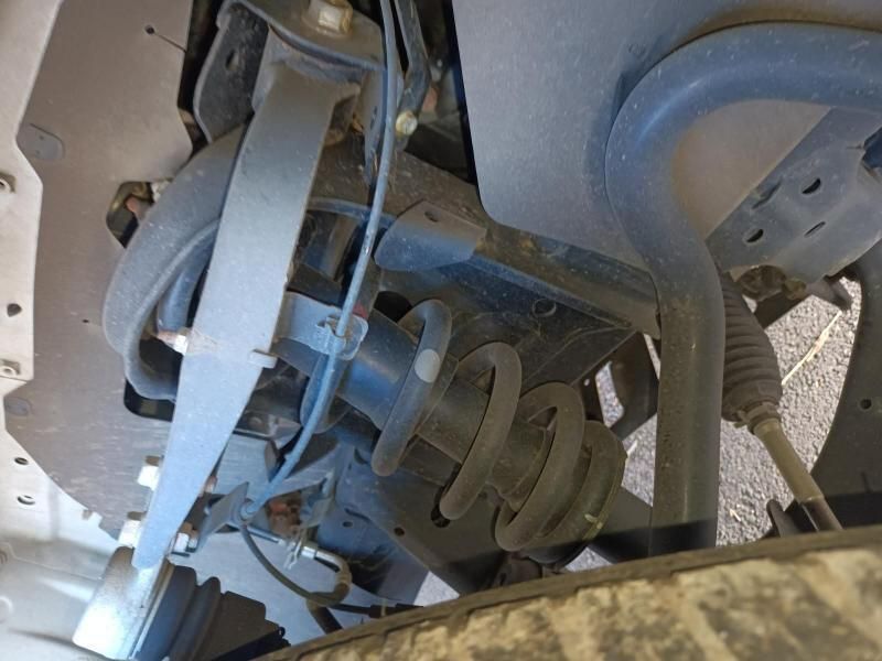 A Close Up of the Underside of a Car 's Suspension System — South West 4WD Wreckers In Harristown, QLD