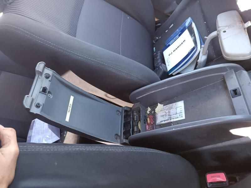 A Car Arm Rest With a Sticker That Says ' Airbag ' on It — South West 4WD Wreckers In Harristown, QLD