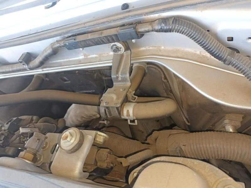 A Close Up of a Car Engine With a Hose Attached to It — South West 4WD Wreckers In Harristown, QLD