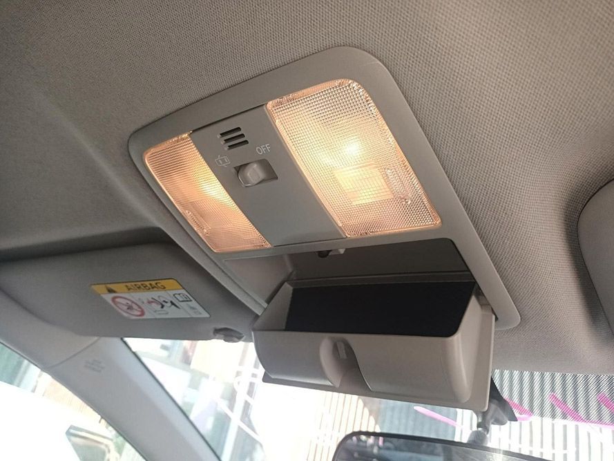 A Car Ceiling Light with a Sunglasses Holder Underneath It — South West 4WD Wreckers in Harristown, QLD
