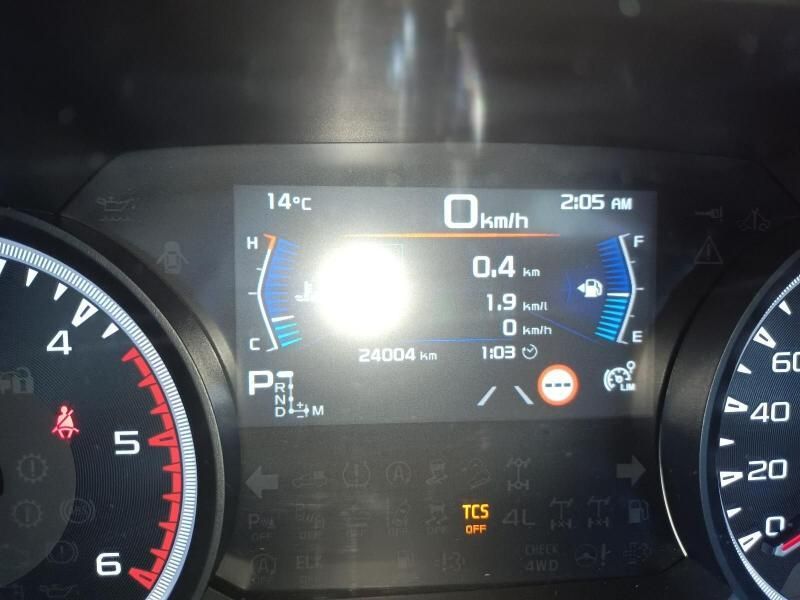 A Close Up of a Car Dashboard With a Tcs Light on — South West 4WD Wreckers In Harristown, QLD