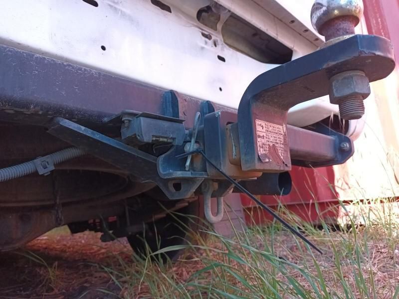A Trailer Hitch is Attached to the Back of a White Truck — South West 4WD Wreckers In Harristown, QLD