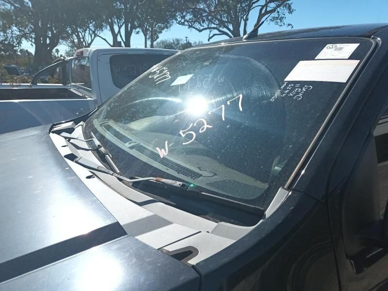 A Black Truck With a Windshield That Says W.5217 on It — South West 4WD Wreckers In Harristown, QLD