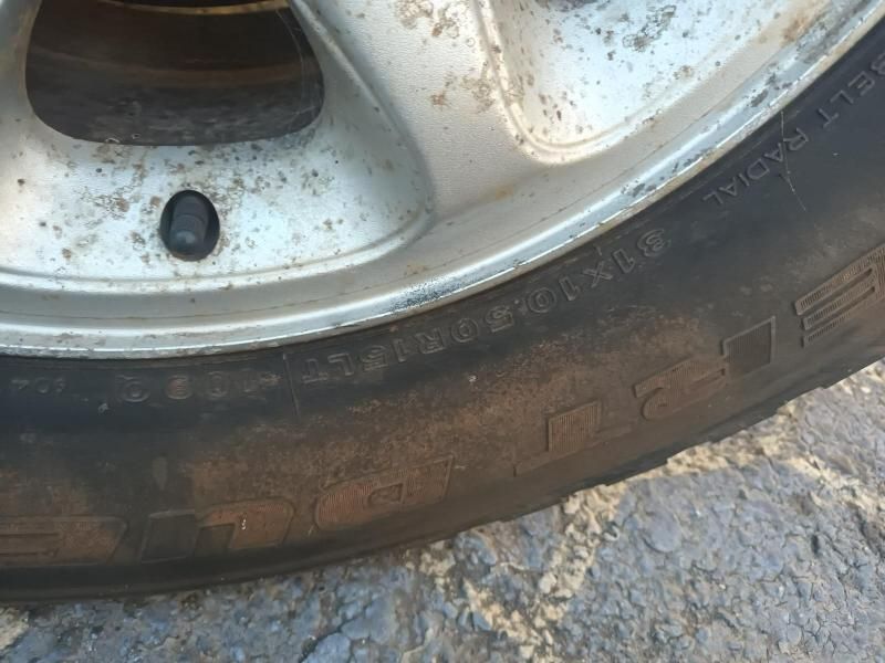 A Close Up of a Flat Tire on a Car Wheel — South West 4WD Wreckers In Brisbane, QLD