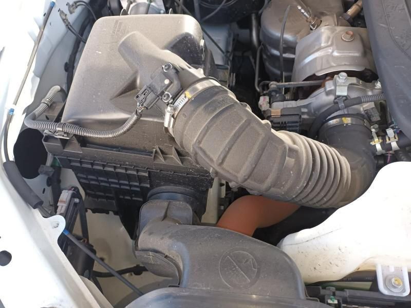 A Close Up of the Engine of a White Car — South West 4WD Wreckers In Harristown, QLD