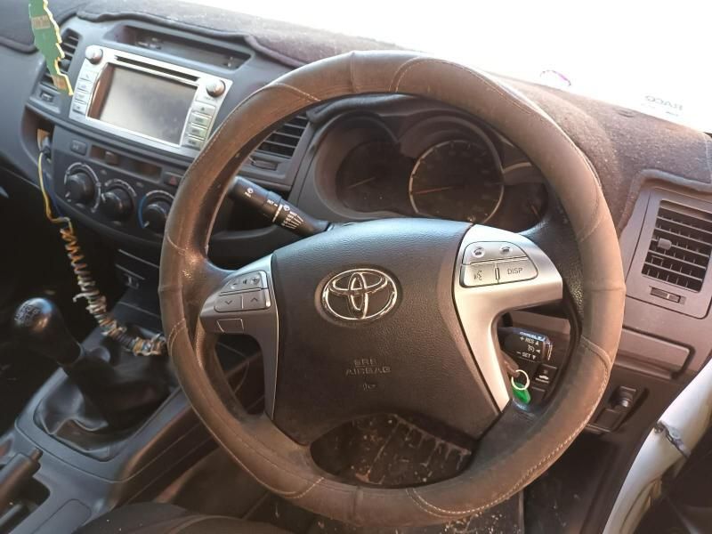 A Toyota Car Has a Steering Wheel Cover on It — South West 4WD Wreckers In Harristown, QLD