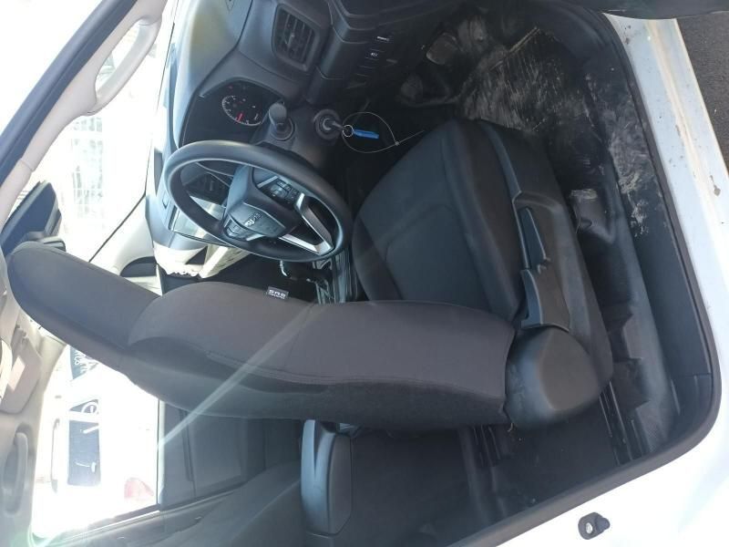 A White Car With a Black Seat and Steering Wheel — South West 4WD Wreckers In Harristown, QLD