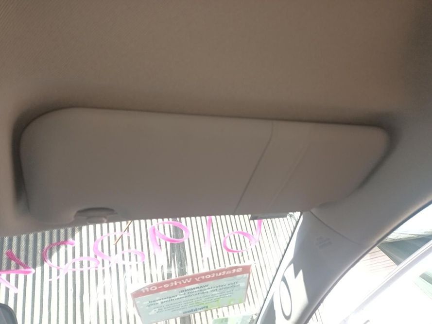 A Sun Visor is Hanging from the Ceiling of a Car — South West 4WD Wreckers in Harristown, QLD