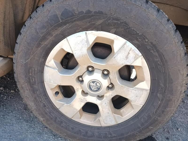 A Close Up of a Dirty Tire on a Car — South West 4WD Wreckers In Harristown, QLD