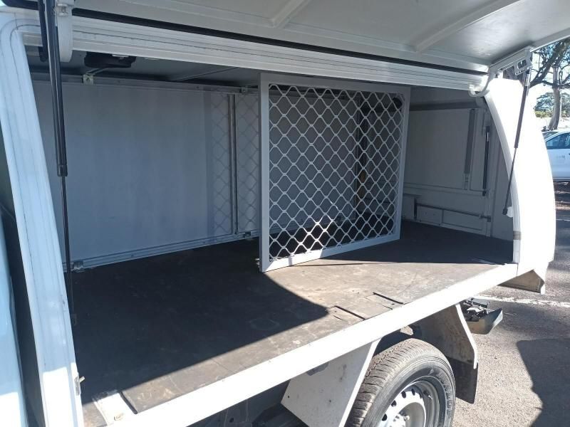 The Back of a White Truck With a Cage in the Back — South West 4WD Wreckers In Harristown, QLD