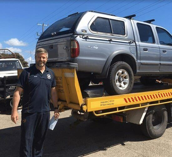A Blue Suv With a Snorkel is Parked in a Dirt Lot — South West 4WD Wreckers In Brisbane, QLD