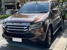 A Brown Isuzu Truck is Parked on the Side of the Road — South West 4WD Wreckers In Brisbane, QLD