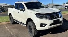 A White Pickup Truck is Parked in a Parking Lot — South West 4WD Wreckers In Brisbane, QLD