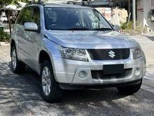 A Silver Suzuki Grand Vitara is Parked in a Driveway — South West 4WD Wreckers In Brisbane, QLD