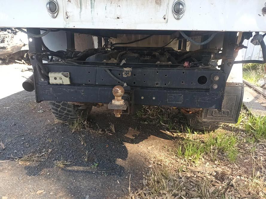 The Back End of a Truck with a Trailer Hitch Attached to It — South West 4WD Wreckers in Harristown, QLD