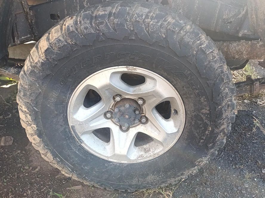 A Close Up of a Muddy Tire on a Car — South West 4WD Wreckers in Harristown, QLD