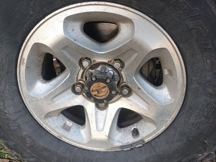 A Close Up of a Car Wheel with a Tire on It — South West 4WD Wreckers in Harristown, QLD