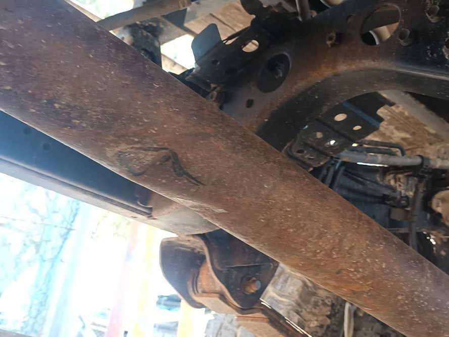 A Close Up of a Rusty Pipe on the Underside of a Vehicle — South West 4WD Wreckers in Harristown, QLD