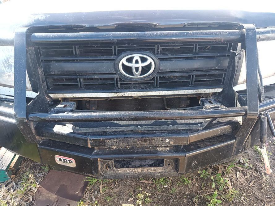 The Front of a Toyota Truck with a Winch Attached to It — South West 4WD Wreckers in Harristown, QLD
