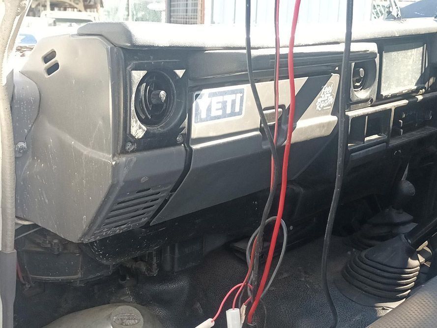 A Yeti Jeep with a Bunch of Wires Connected to It — South West 4WD Wreckers in Harristown, QLD