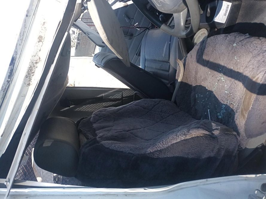 The Inside of a Car with a Seat Cover on It — South West 4WD Wreckers in Harristown, QLD