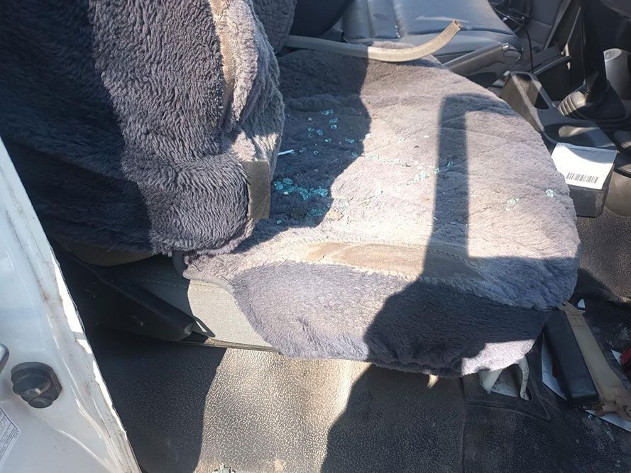 A Car Seat with a Broken Glass on It — South West 4WD Wreckers in Harristown, QLD