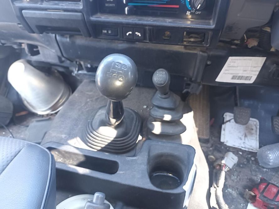 A Close Up of a Car's Shifter and a Cup Holder — South West 4WD Wreckers in Harristown, QLD