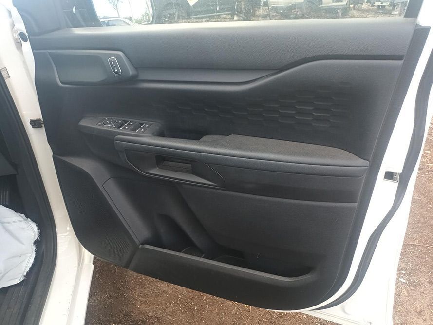 The Inside of a White Car with the Door Open — South West 4WD Wreckers in Harristown, QLD