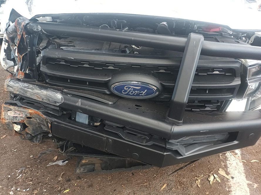 The Front End of a Ford Truck is Damaged in a Car Accident — South West 4WD Wreckers in Harristown, QLD
