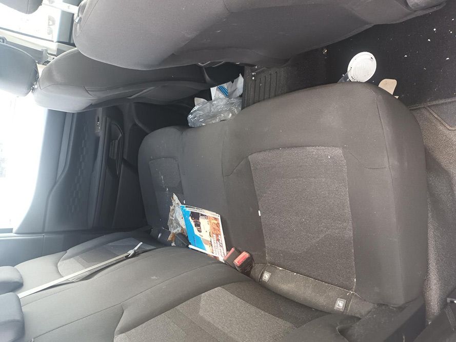 The Back Seat of a Car is Covered in Trash — South West 4WD Wreckers in Harristown, QLD