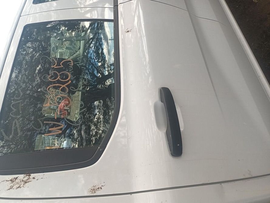 A White Car Side View in a Parking Lot — South West 4WD Wreckers in Harristown, QLD