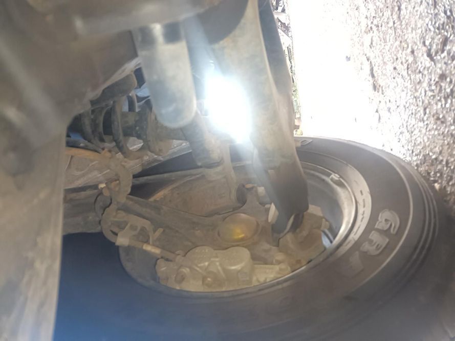 A Close Up of a Tire on a Car with a Light Shining on It — South West 4WD Wreckers in Harristown, QLD