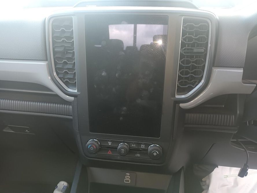 A Close Up of the Dashboard of a Car with a Touchscreen Display — South West 4WD Wreckers in Harristown, QLD