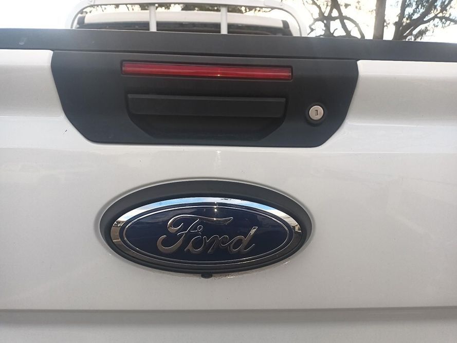 The Back of a White Ford Truck with a Ford Logo — South West 4WD Wreckers in Harristown, QLD 