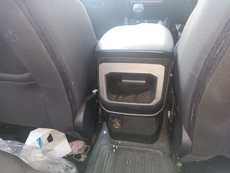 A Trash Can is Sitting in the Back Seat of a Car — South West 4WD Wreckers in Harristown, QLD