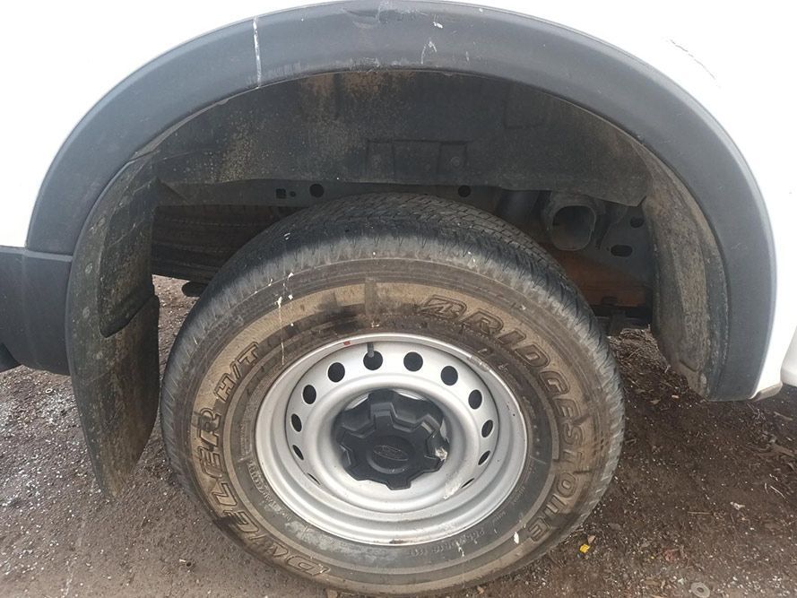 A Close Up of a Tire on a White Truck — South West 4WD Wreckers in Harristown, QLD
