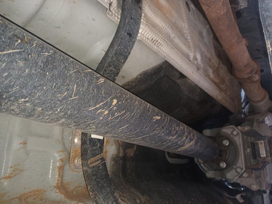 A Close Up of the Underside of a Car Showing the Exhaust Pipe — South West 4WD Wreckers in Harristown, QLD