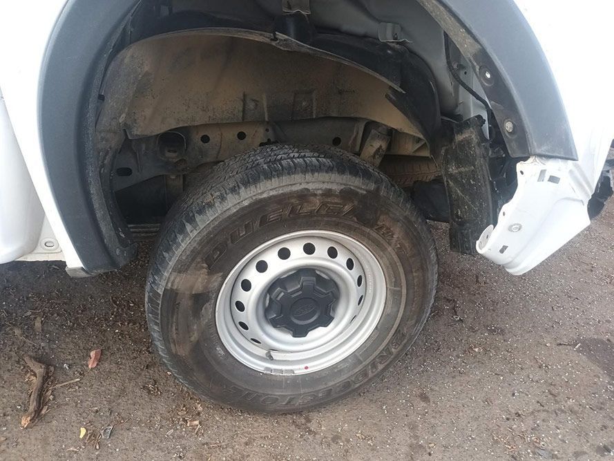 A Close Up of a Tire on a White Truck — South West 4WD Wreckers in Harristown, QLD