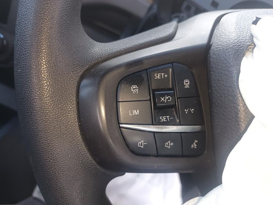 A Close Up of a Steering Wheel with Buttons on It — South West 4WD Wreckers in Harristown, QLD