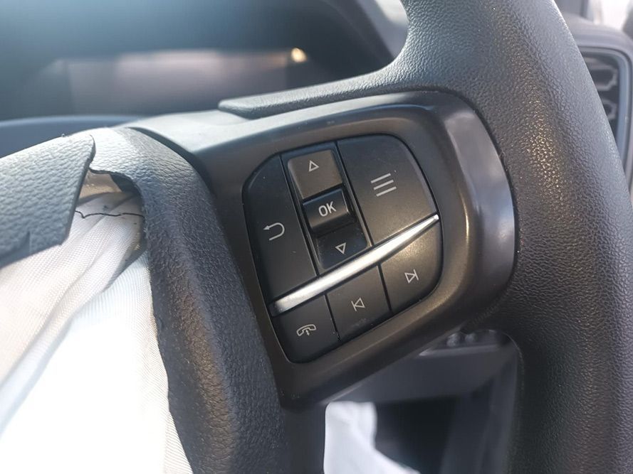 A Close Up of a Car Steering Wheel with Buttons on It — South West 4WD Wreckers in Harristown, QLD
