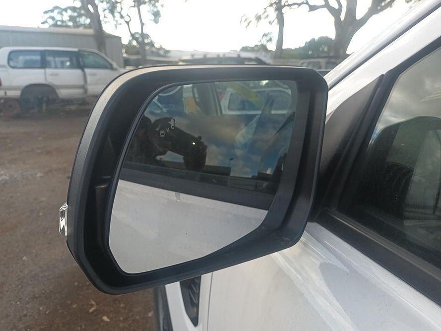 A Close Up of a Side View Mirror on a White Car — South West 4WD Wreckers in Harristown, QLD