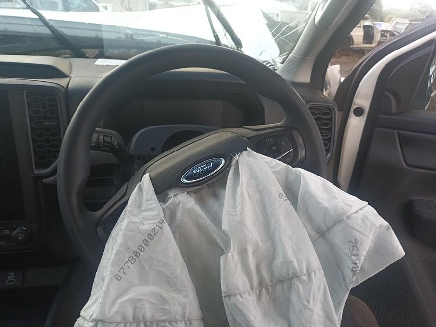 The Inside of a Ford Car with Airbag on the Steering Wheel — South West 4WD Wreckers in Harristown, QLD