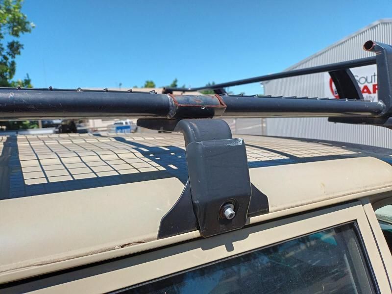 A Roof Rack is Attached to the Roof of a Car — South West 4WD Wreckers In Brisbane, QLD