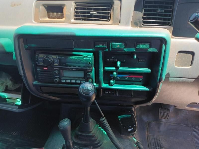 The Dashboard of a Car With a Radio and a Shifter — South West 4WD Wreckers In Brisbane, QLD