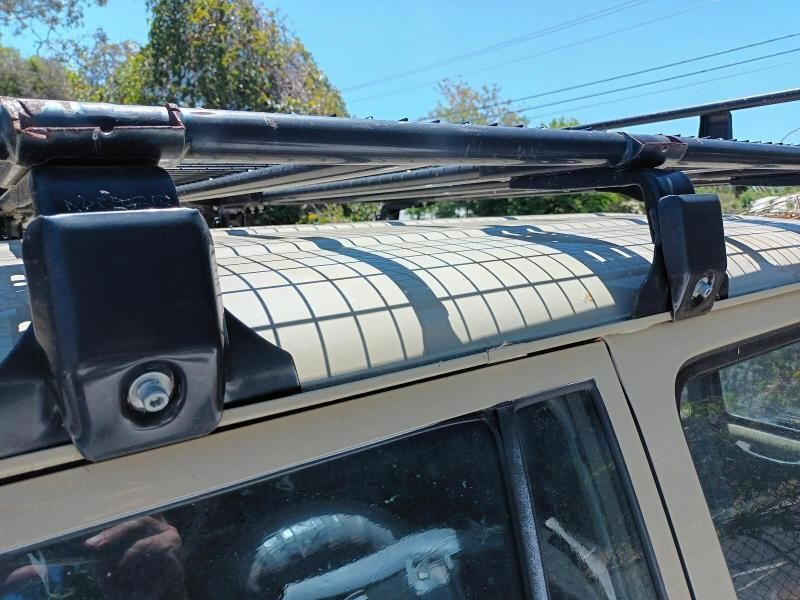 A Roof Rack is Attached to the Roof of a Car — South West 4WD Wreckers In Brisbane, QLD