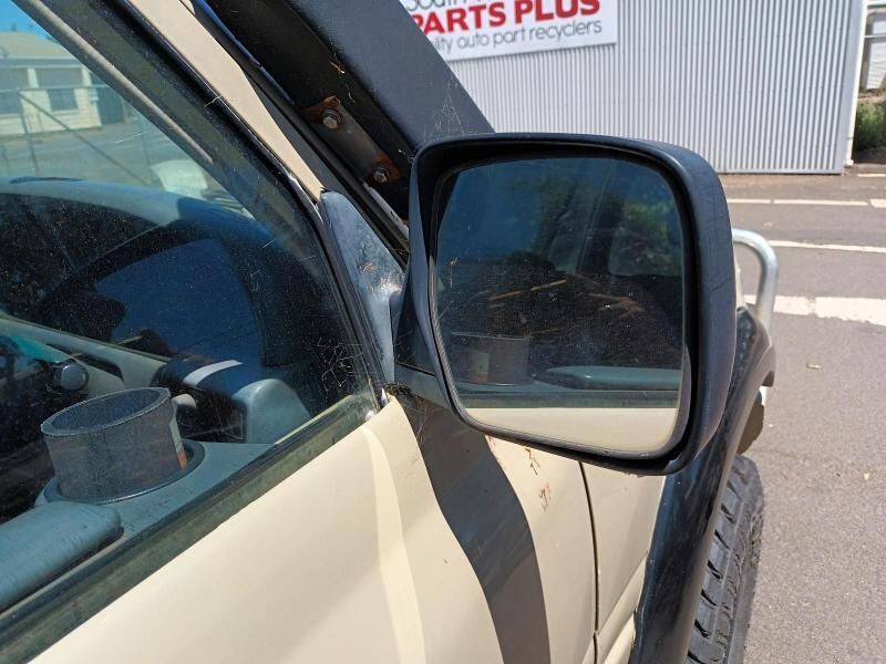 A Car is Parked in Front of a Sign That Says Parts Plus — South West 4WD Wreckers In Brisbane, QLD