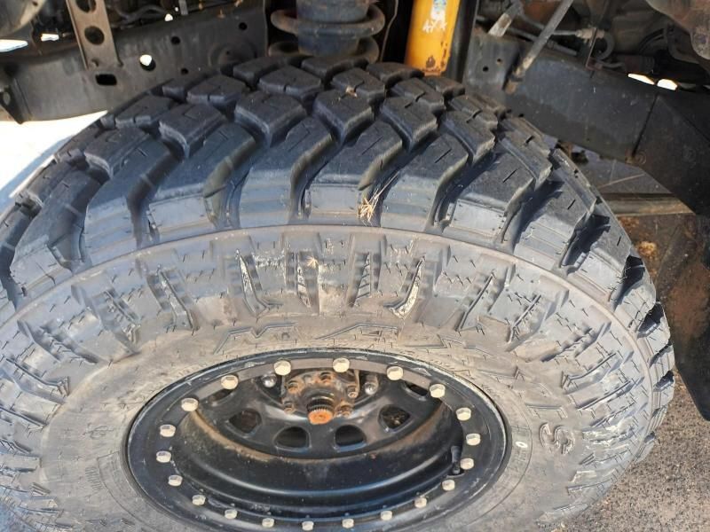 A Close Up of a Tire With a Rim That Says Bfgoodrich on It — South West 4WD Wreckers In Brisbane, QLD