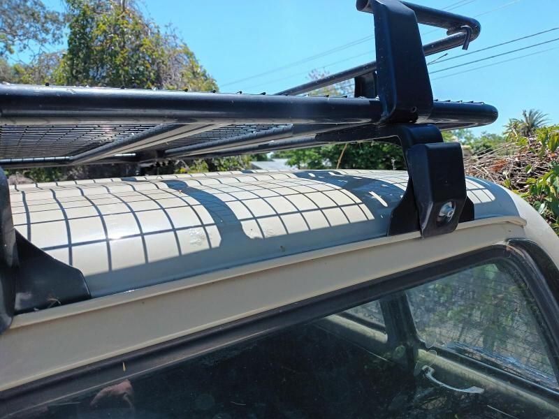 A Roof Rack is Attached to the Roof of a Car — South West 4WD Wreckers In Brisbane, QLD