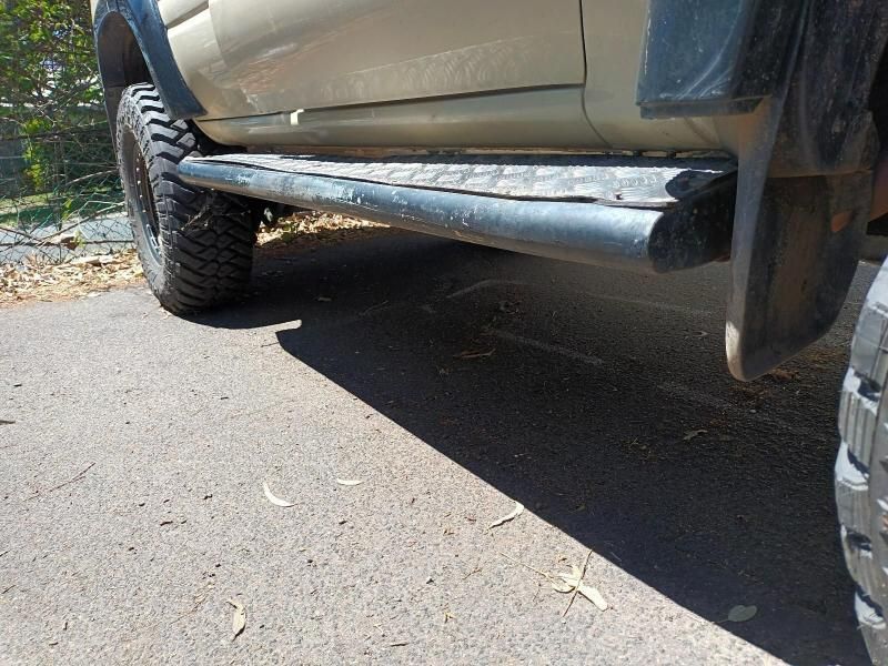 The Side of a Truck is Parked on the Side of the Road — South West 4WD Wreckers In Brisbane, QLD