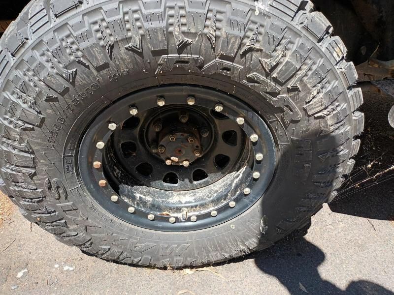 A Close Up of a Tire With Holes in It — South West 4WD Wreckers In Brisbane, QLD